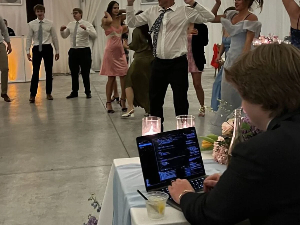 Work-Life Balance - Linkedin Co- founder - Working on his laptop During his wedding