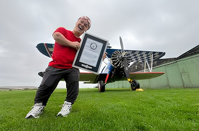 Sky’s No Limit–4 Foot John Ferguson Breaks Wing Walking World Record